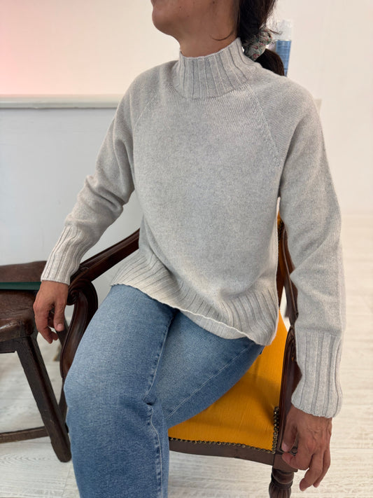 Maglia lupetto fondo costa con spacchi